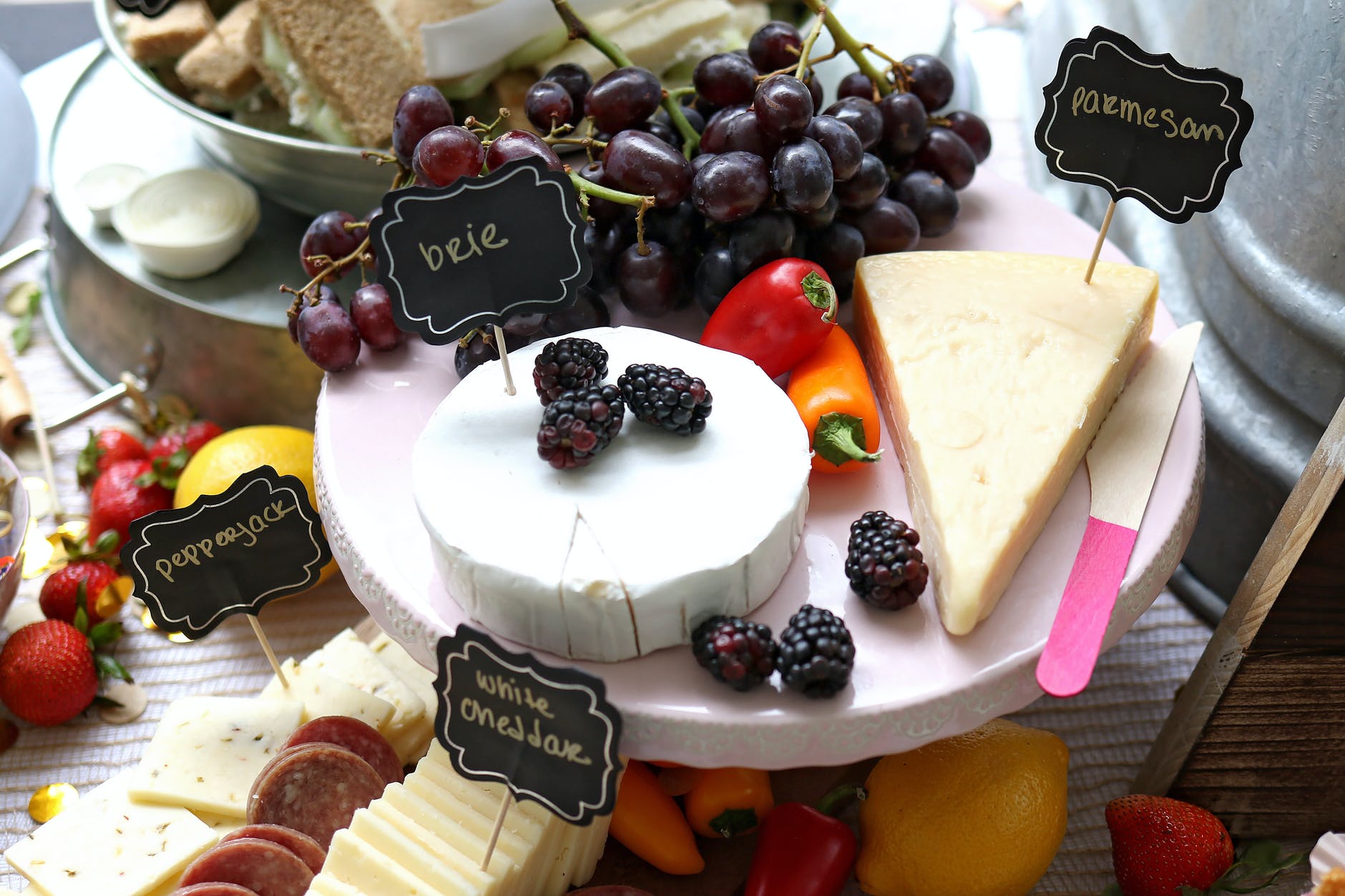 sliced cheese served on white tray